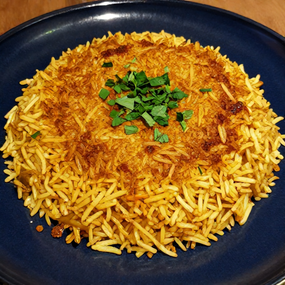 Plated serving of Persian tahdig rice with saffron crust